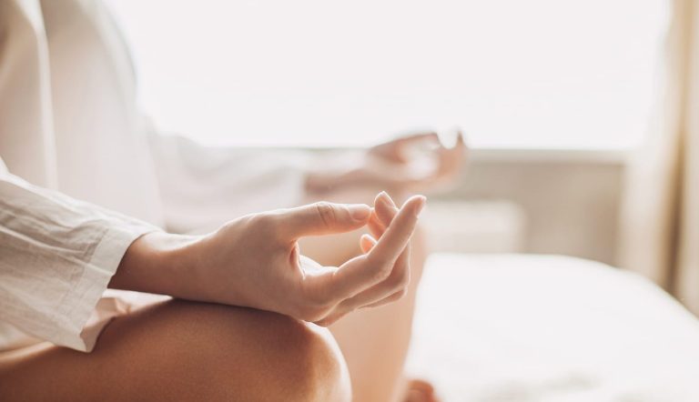 Yoga woman meditating and practicing yoga at home. Recreation, s