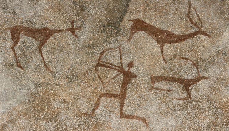 Wall cave with drawings of the primitive person.